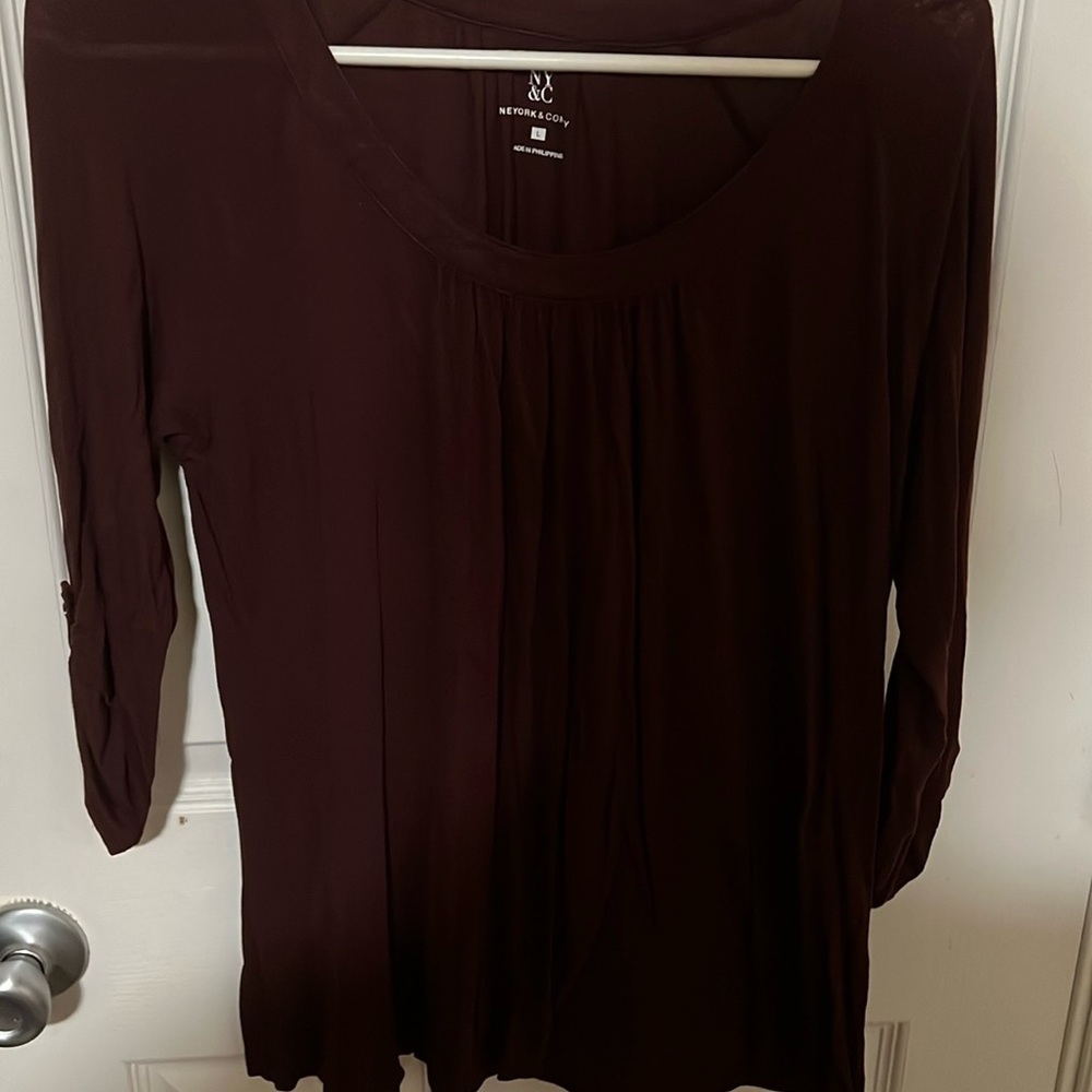 Maroon colored women’s 3/4 length shirt